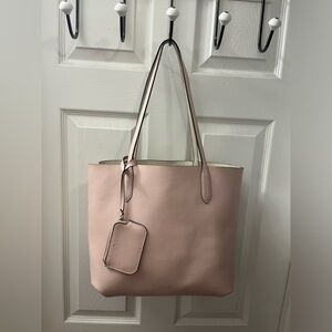 Kate Spade pink and cream reversible tote bag
comes with matching wallet